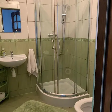 Quarto em Acomodações Particulares Goscinne U Wioli